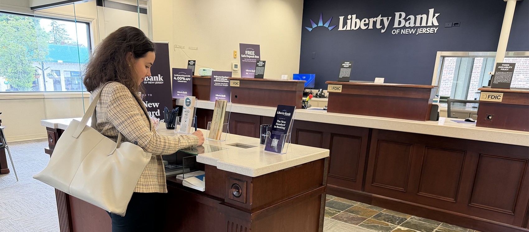 woman in the Liberty Bank lobby